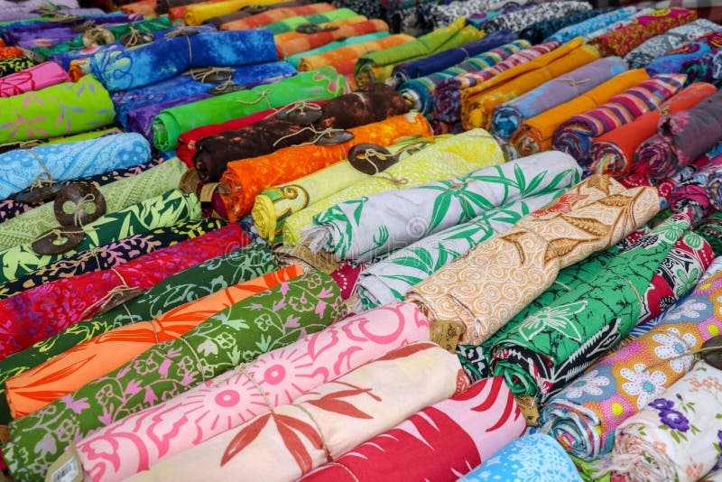 Rolled Up Colored Fabrics Tied with String. Shop with Brightly Colored ...