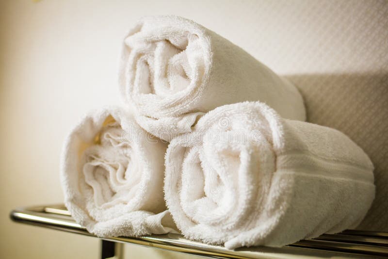White Rolled Towels on Wooden Countertop Spa Beauty Body Care Hygiene  Procedure at Bathroom. Blurred Background Stock Image - Image of sunny,  laundry: 263770707