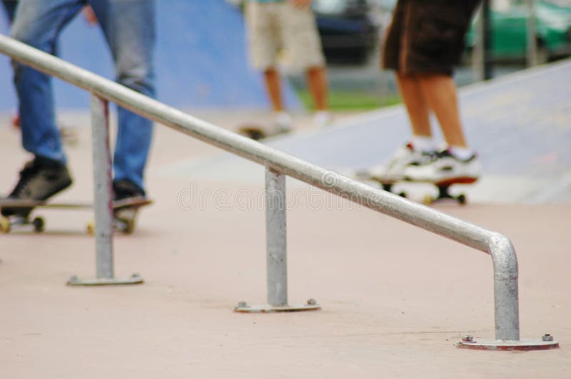 Rollers skaters in skate park. Rollers skaters in skate park