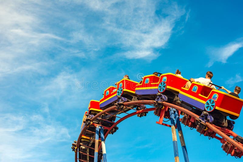 Roller coaster in an amusement park, extreme relaxation for adults and children.