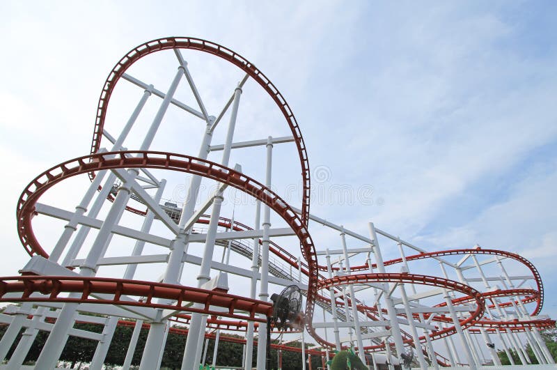Roller coaster with blue sky background