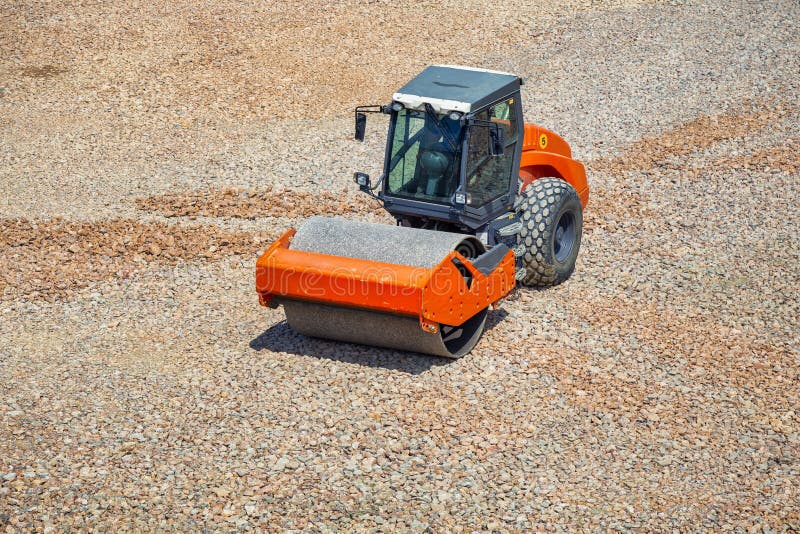 Roller on a construction site leveling royalty free stock image
