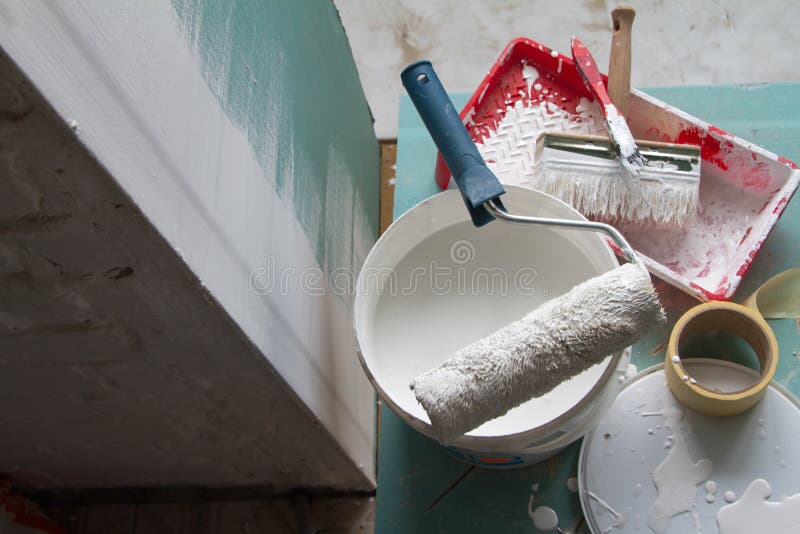Roller Painting Container and the Painting Roller. Stock Photo Image