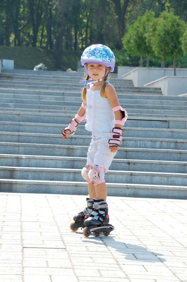 Rollerblading. Child Sport With Rollerblades Stock Photo - Image of