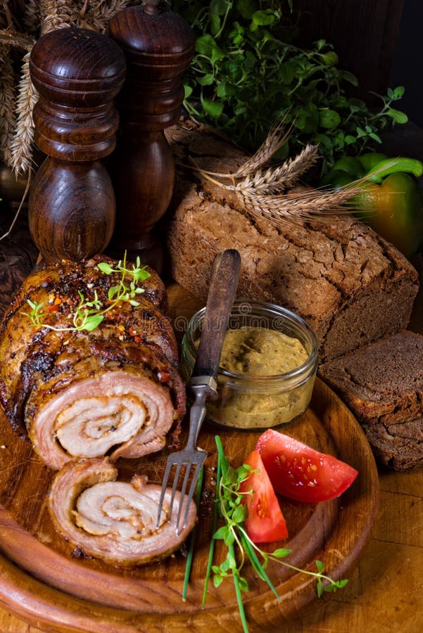 Rolling Roasts Fullly with Dried Fruit and Bacon Stock Photo Image of