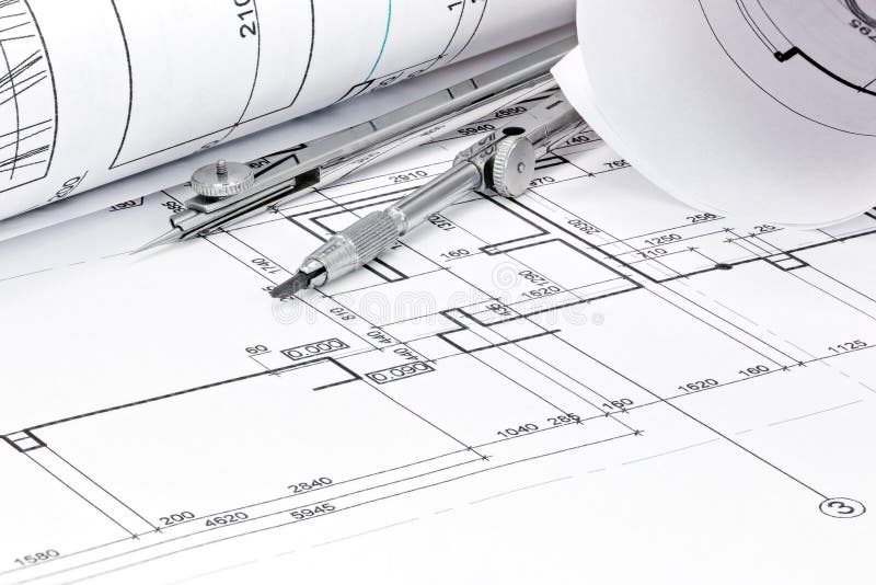 Rolls des Architekturplanes mit Zeichenzirkelnahaufnahme lizenzfreie stockbilder Rolls des Architekturplanes mit Zeichenzirkelnahaufnahme lizenzfreie stockbilder