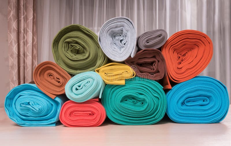 Rolls of knitted fabric stock image. Image of fashion 89853013