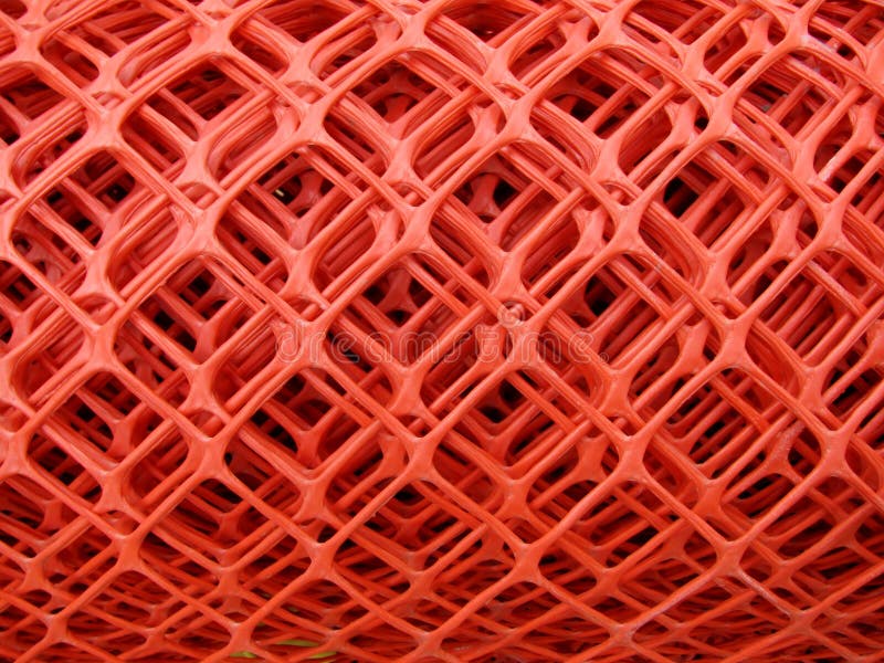 Rolls of plastic fence mesh