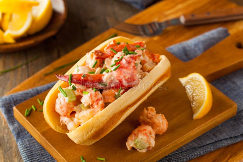 Homemade New England Lobster Roll with Lemons. Homemade New England Lobster Roll with Lemons