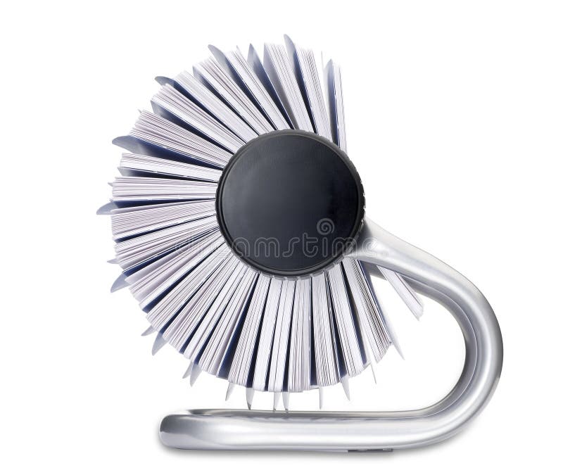 A rolodex rotary card address and telephone contact desk organiser isolated on white with a clipping path. A rolodex rotary card address and telephone contact desk organiser isolated on white with a clipping path