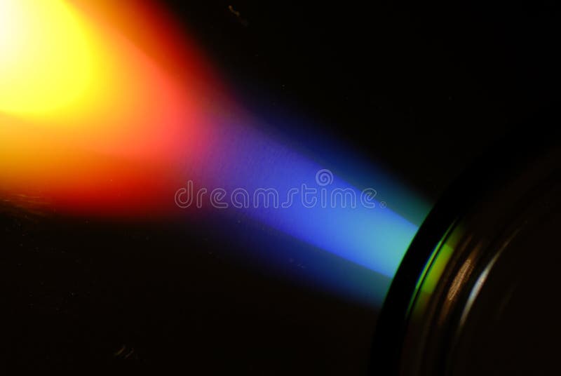 Reflection of light on a cd-rom in black background. Reflection of light on a cd-rom in black background