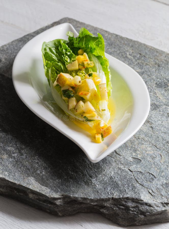 Romaine Lettuce Hearts with Mango Apple Vinaigrette Stock Photo Image of stone, appetizer