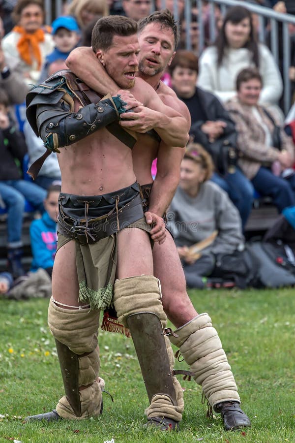 [IMAGE:https://thumbs.dreamstime.com/b/roman-gladiators-make-one-fight-demonstration-alba-iulia-romania-april-apulum-festival-organized-city-hall-91862146.jpg]