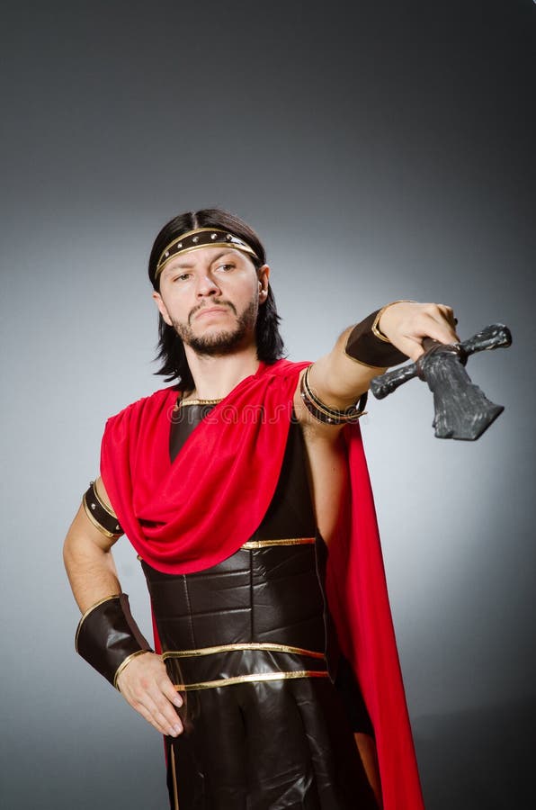 The Roman Warrior with Sword Against Background Stock Photo - Image of ...