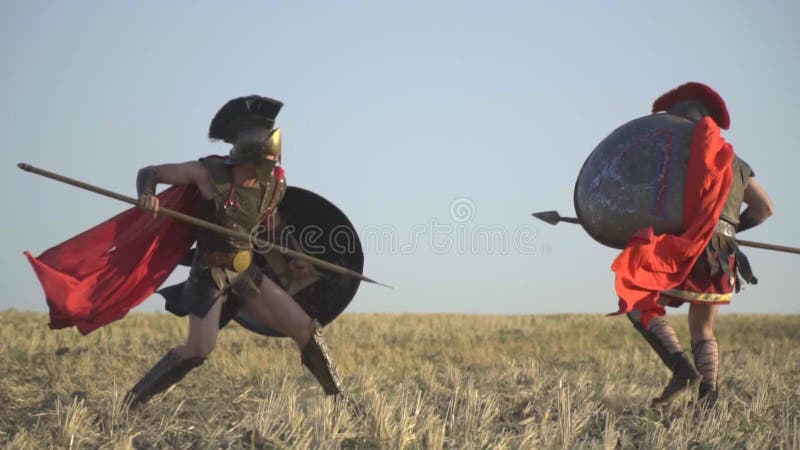 The Roman warrior unusually attacks his opponent with a spear, slow motion