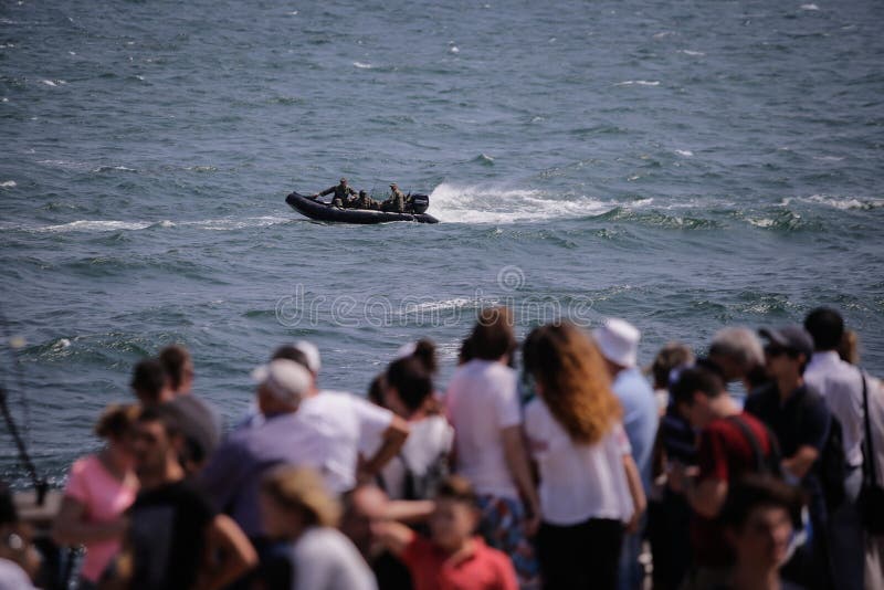Romanian navy soldiers sail with a rubber boat stock photos Romanian navy soldiers sail with a rubber boat stock photos