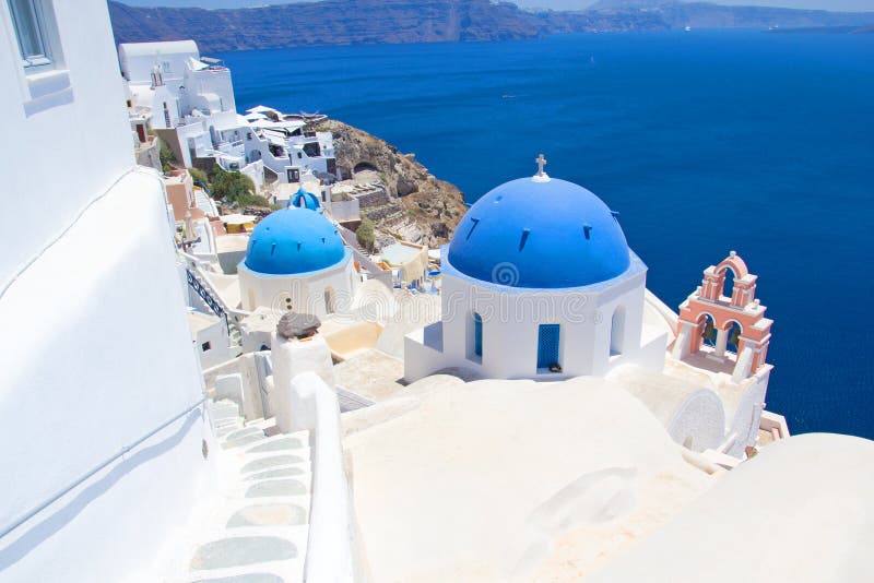Blue Roofs Of Churches On Santorini Island, Greece Stock Photo Image