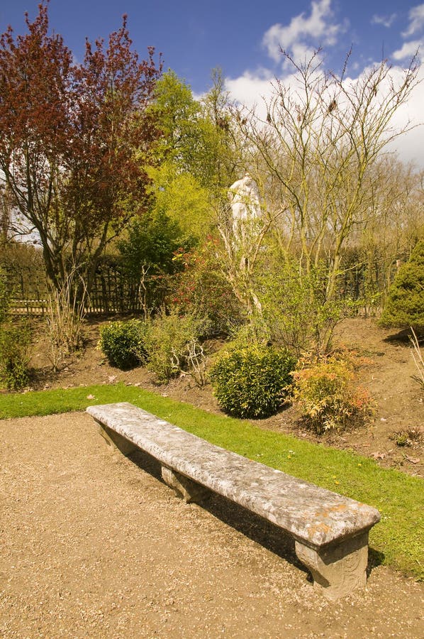 Romantic bench with statue of Hercules