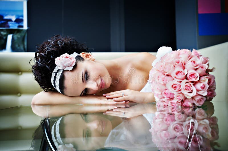 Romantic bride with a wedding bouquet