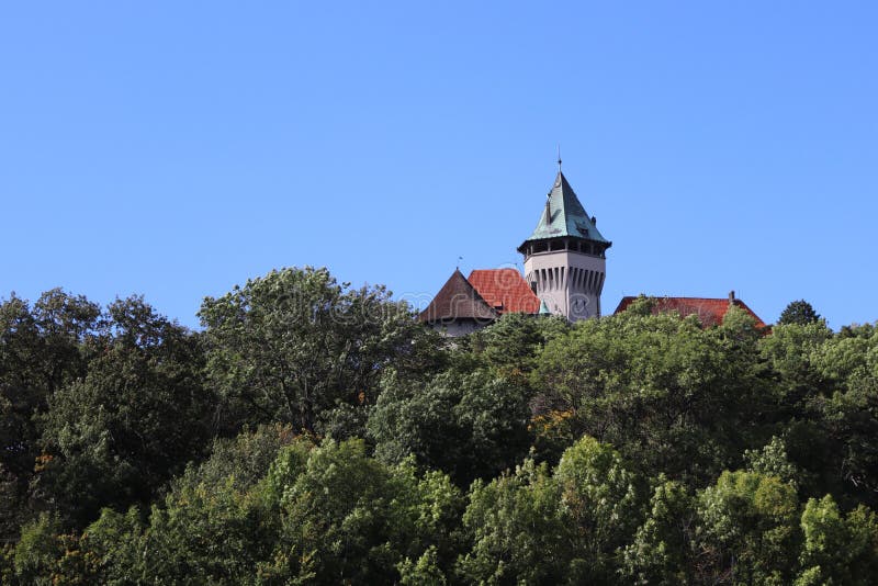 Romantic castle - fortress with tower in the forest. Smolenice castle, Congress Center of SAS - built in 15th century