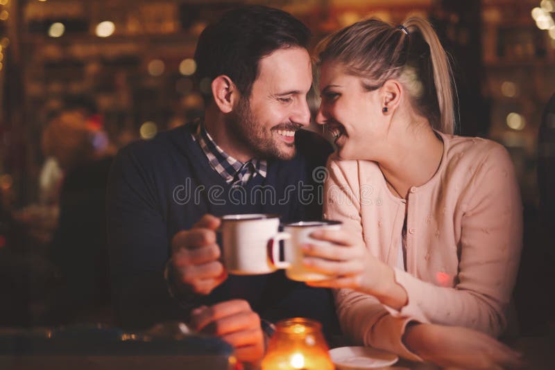Romantic couple dating in pub royalty free stock photo