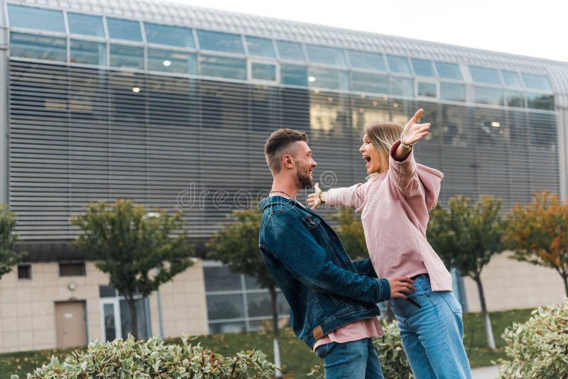 Romantic Couple Embracing Each Other at Airport Stock Photo - Image of ...