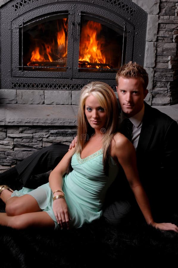 Romantic couple fireplace roaring