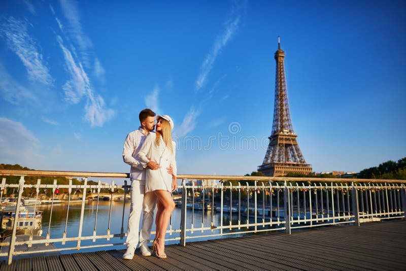 Romantic couple having a date near the Eiffel tower