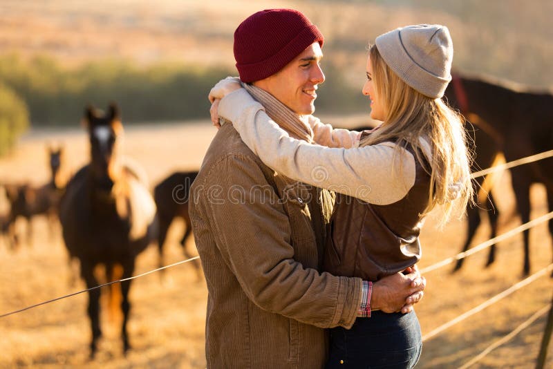Romantic couple horse farm