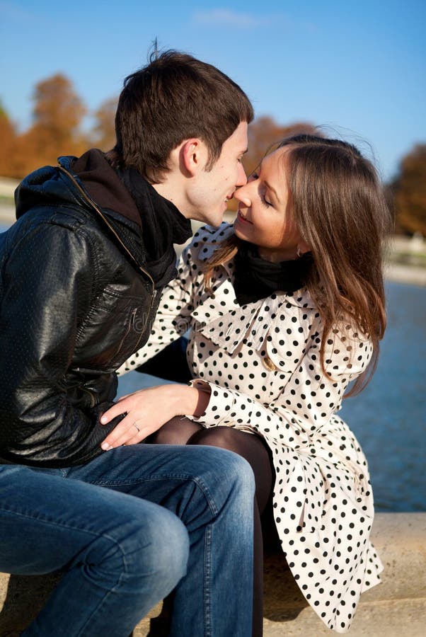 Young Romantic Couple Kissing Near Eiffel Tower Stock Image Image of