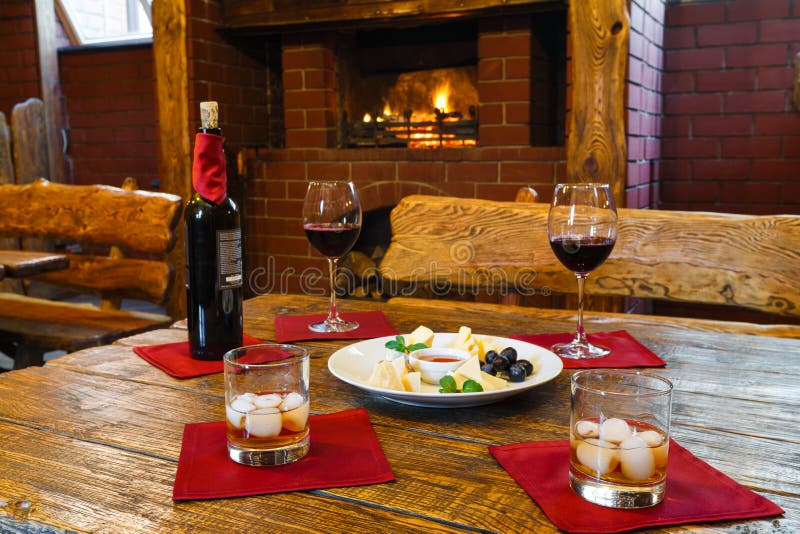 Romantic dinner for two near fireplace