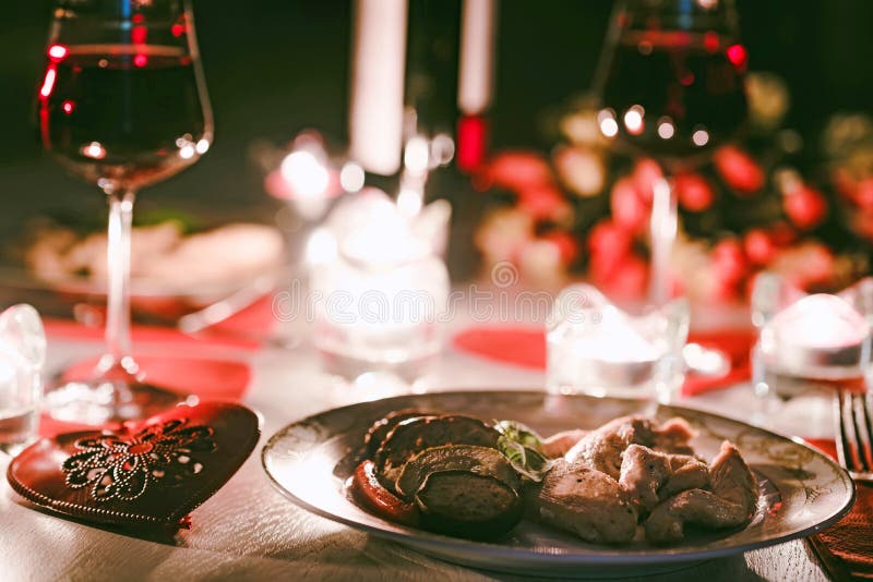 Romantic Dinner - Glass Of Red Wine And Candles Stock Image - Image of