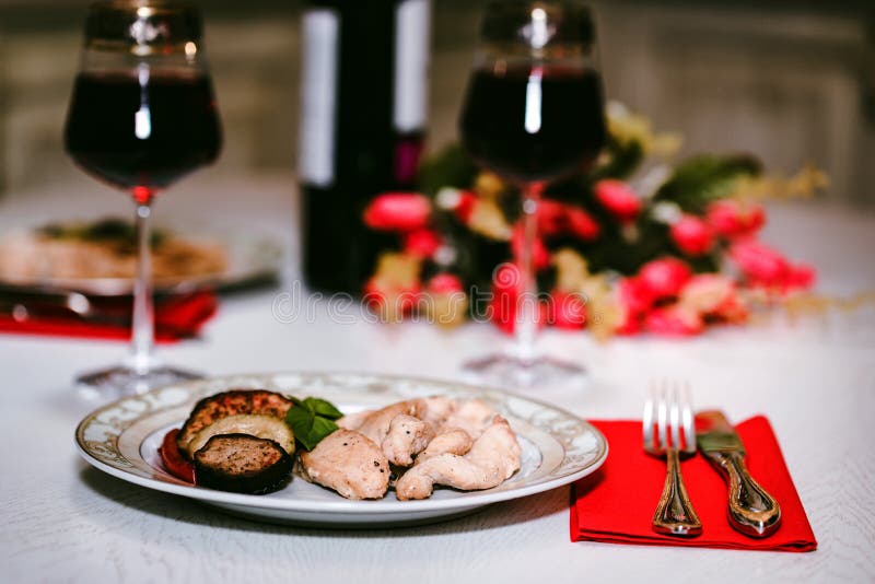 Romantic Dinner for Two with Wine,meat and Flowers Stock Photo - Image