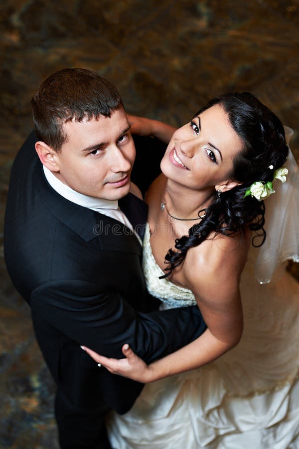 Romantic embrace bride and groom in wedding dance