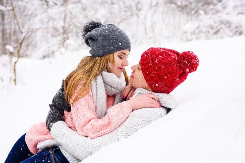 romantic girlfriend under snow