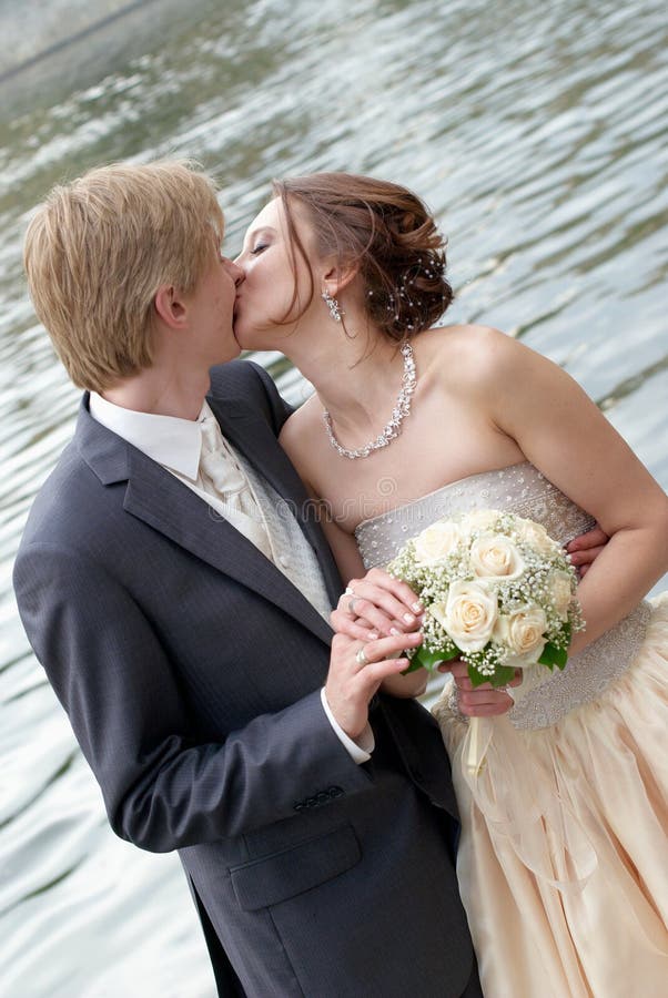 Romantic kiss of the bride and the groom