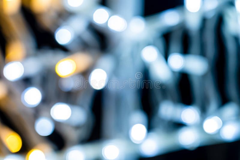 Romantic Lights on Christmas Decorations on Black Background. Defocused