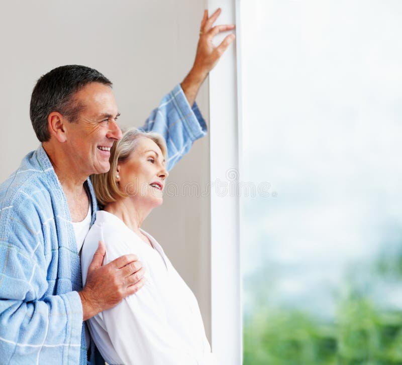 Romantic Mature Couple Closeup Of Romantic Mature Couple Smiling Head To Head Stock Image