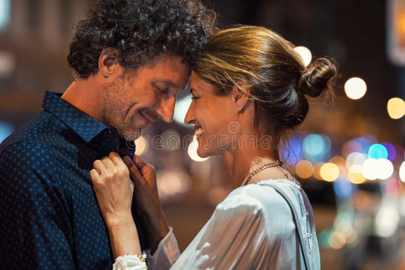 Mature couple in love at night stock image
