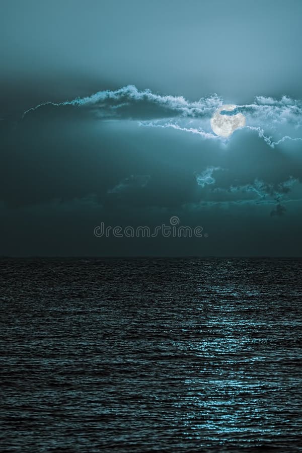Romantic moonscape over tranquil sea. Turquoise blue moon sky. stock image Romantic moonscape over tranquil sea. Turquoise blue moon sky. stock image