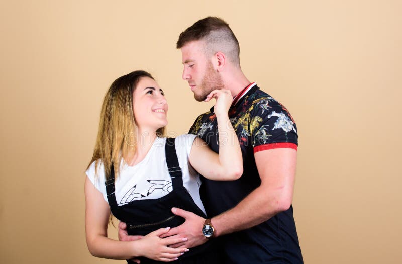 Romantic relations. Couple in love. Couple goals concept. Man and woman beige background. Family love. Couple dating royalty free stock photography Romantic relations. Couple in love. Couple goals concept. Man and woman beige background. Family love. Couple dating royalty free stock photography