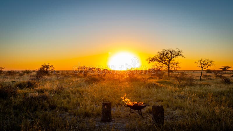 A romantic sundowner in Africa with a spectacular view, Onguma Game Reserve, Namibia.