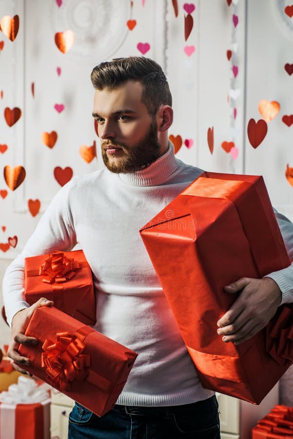 Man Celebrate Valentines Day Man With Boxes In Shape Of Heart Man In