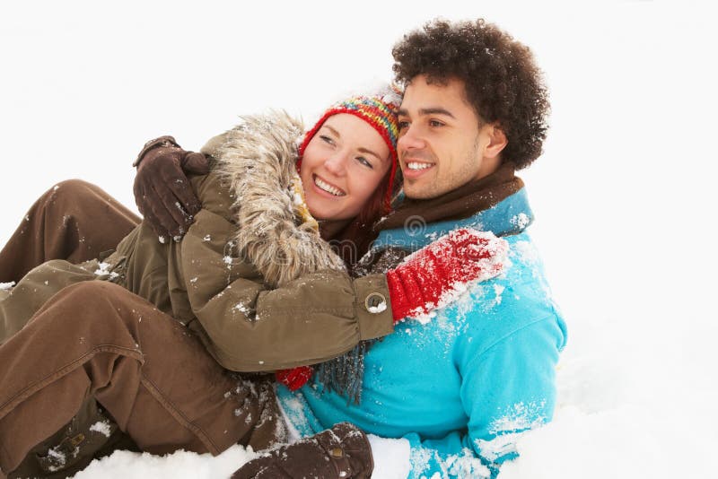 Romantic Teenage Couple Having Fun In Snow