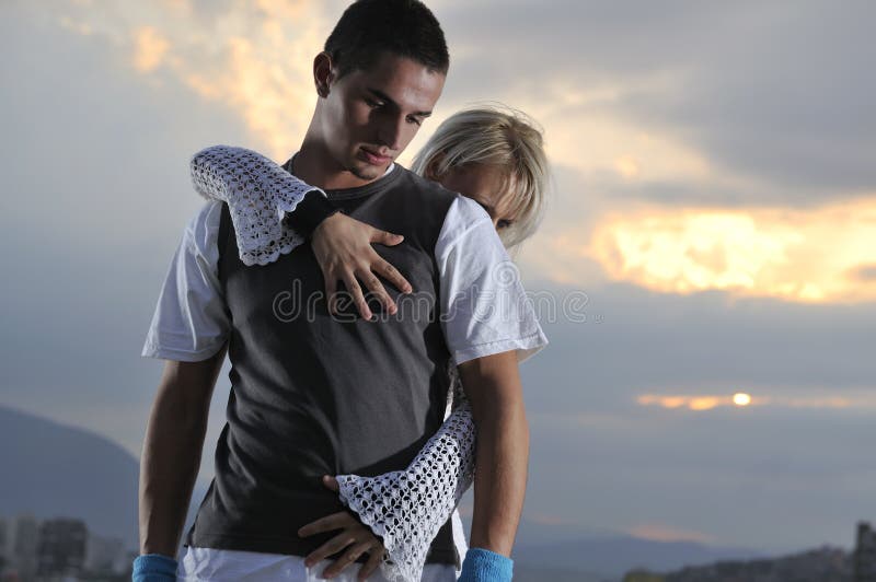 Romantic urban couple dancing outdoor