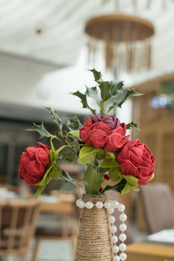 Romantic Valentine or other event celebration table setting with red paper roses