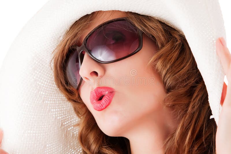 Romantic woman. Sun glasses and straw hat