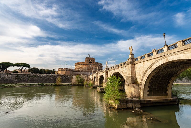 Rome - Castel Sant’Angelo or Mausoleo di Adriano with the ancient bridge and Tiber River. UNESCO world heritage site. Latium, Italy, Europe. Rome - Castel Sant’Angelo or Mausoleo di Adriano with the ancient bridge and Tiber River. UNESCO world heritage site. Latium, Italy, Europe