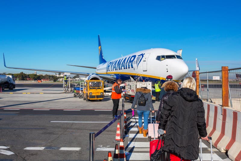 Rome Ciampino, Italy - January 12, 2019: People waiting for boarding to Ryanair plane on Ciampino Airport near Rome. Ryanair is