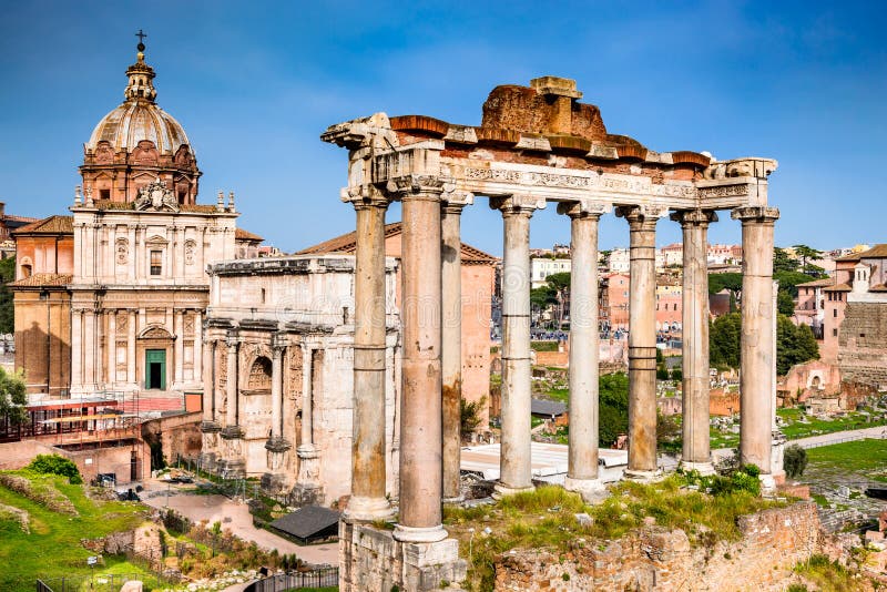 Rome, Italy. Sunset view with ruins of Imperial Forum, Roman Empire. Background with Colosseum (Colosseo or Coliseum). Rome, Italy. Sunset view with ruins of Imperial Forum, Roman Empire. Background with Colosseum (Colosseo or Coliseum).